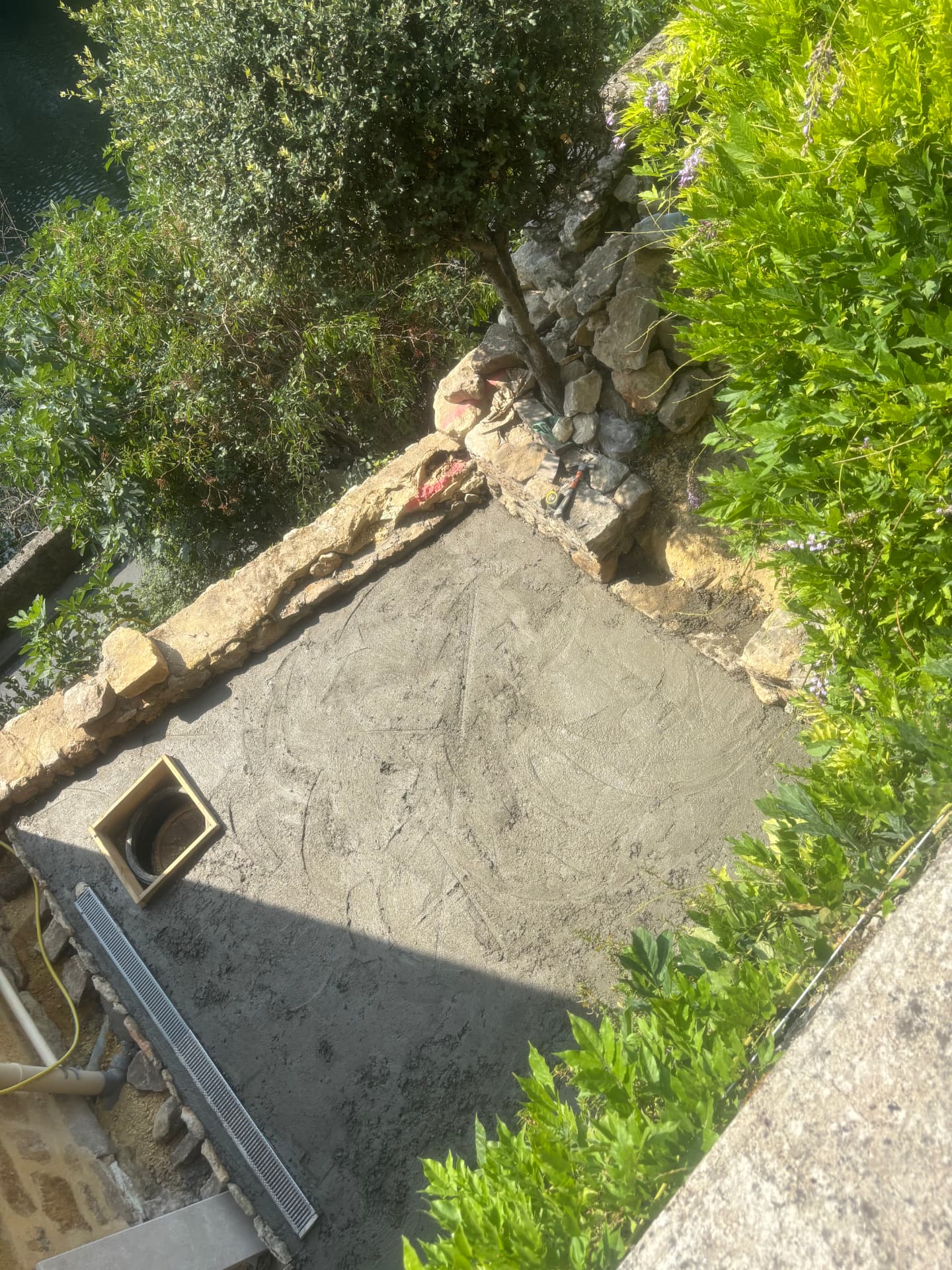 Finished concrete slab with the drainage channel installed