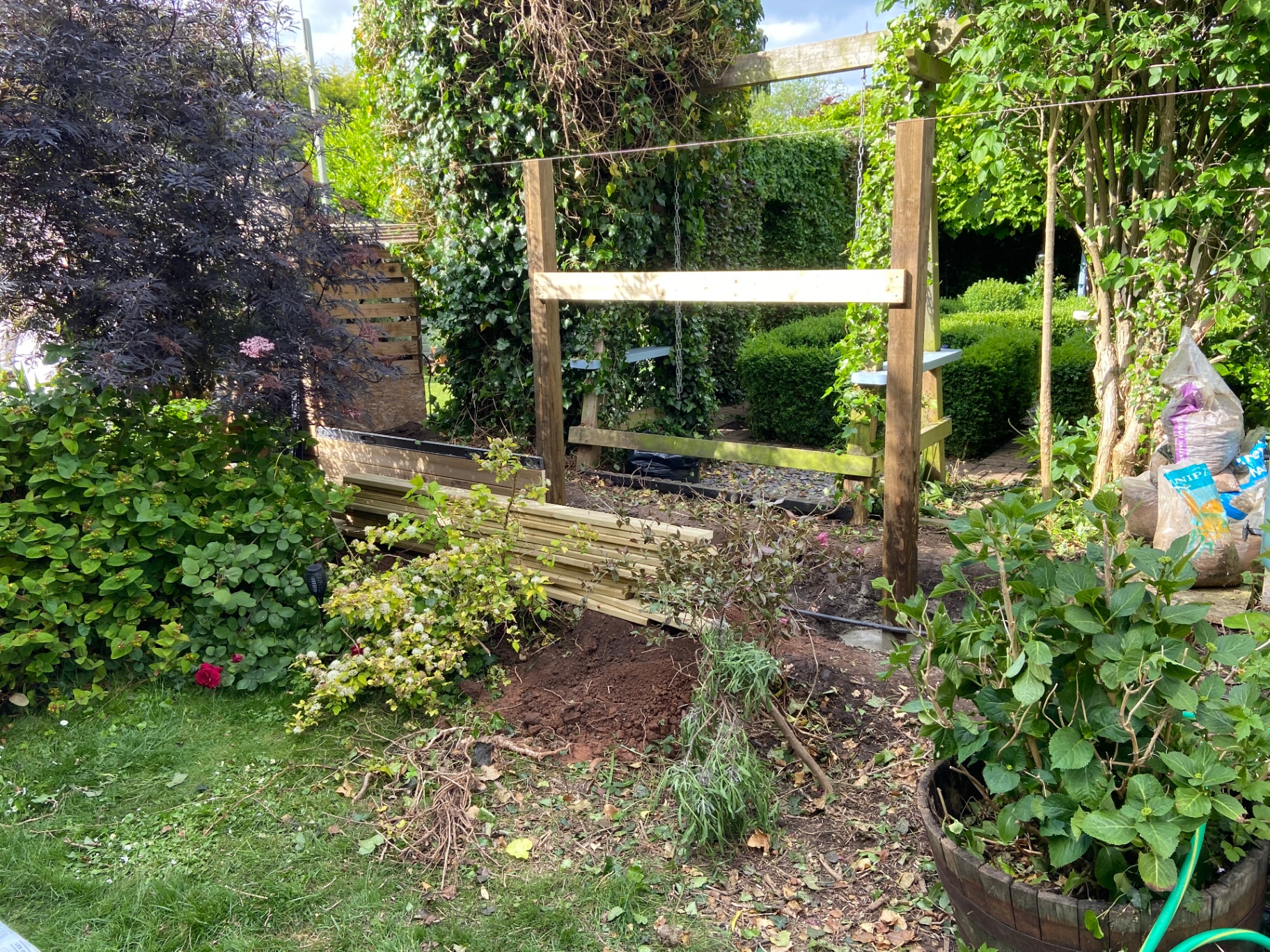 Structural work: new posts set for the pergola and boundary