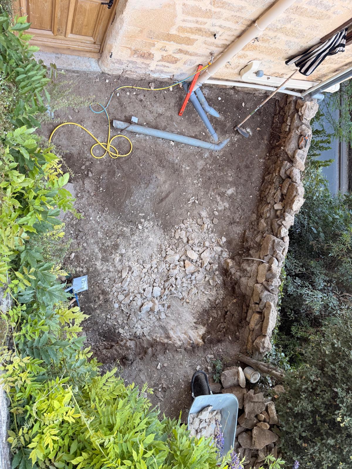 Overhead view of the dug-out area with drainage pipework laid out